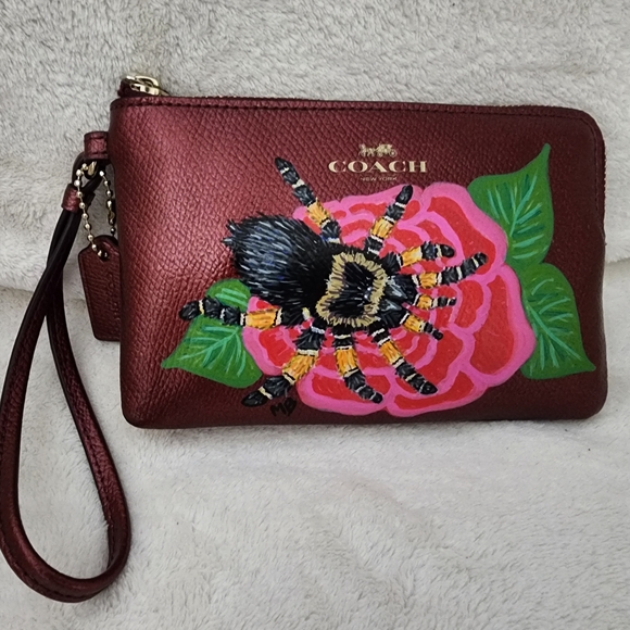 Coach Burgundy Wristlet with Floral and Spider Design - Picture 1 of 4